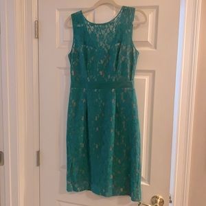 Size 8 BCBG lace green dress with tan under lay.